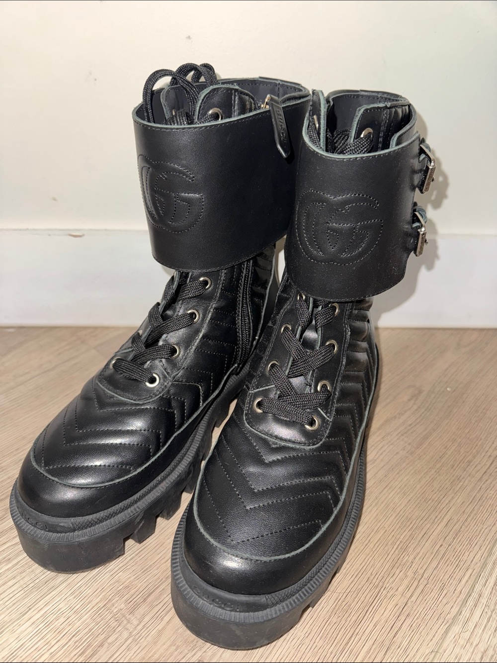 Black Quilted Lace-Up Ankle Boots with Buckle Cuffs
